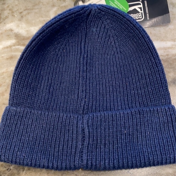 - Hat beanie PGA Tour navy ribbed beanie. New with tags. Can wear cuffed.
C - Picture 2 of 4